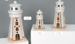 Set di fari in porcellana e legno con illuminazione LED interna per bomboniere.