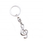 Portachiavi Chiave di Violino Lucida G567-P Primo piano di un portachiavi elegante a forma di Chiave di Violino lucida e specchiata, con un robusto anello in metallo cromato, ideale come bomboniera per eventi musicali.
