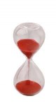 Bomboniera Laurea Clessidra in Vetro con Sabbia Rossa - h 10cm Clessidra in vetro con sabbia rossa per bomboniera laurea altezza 10cm.