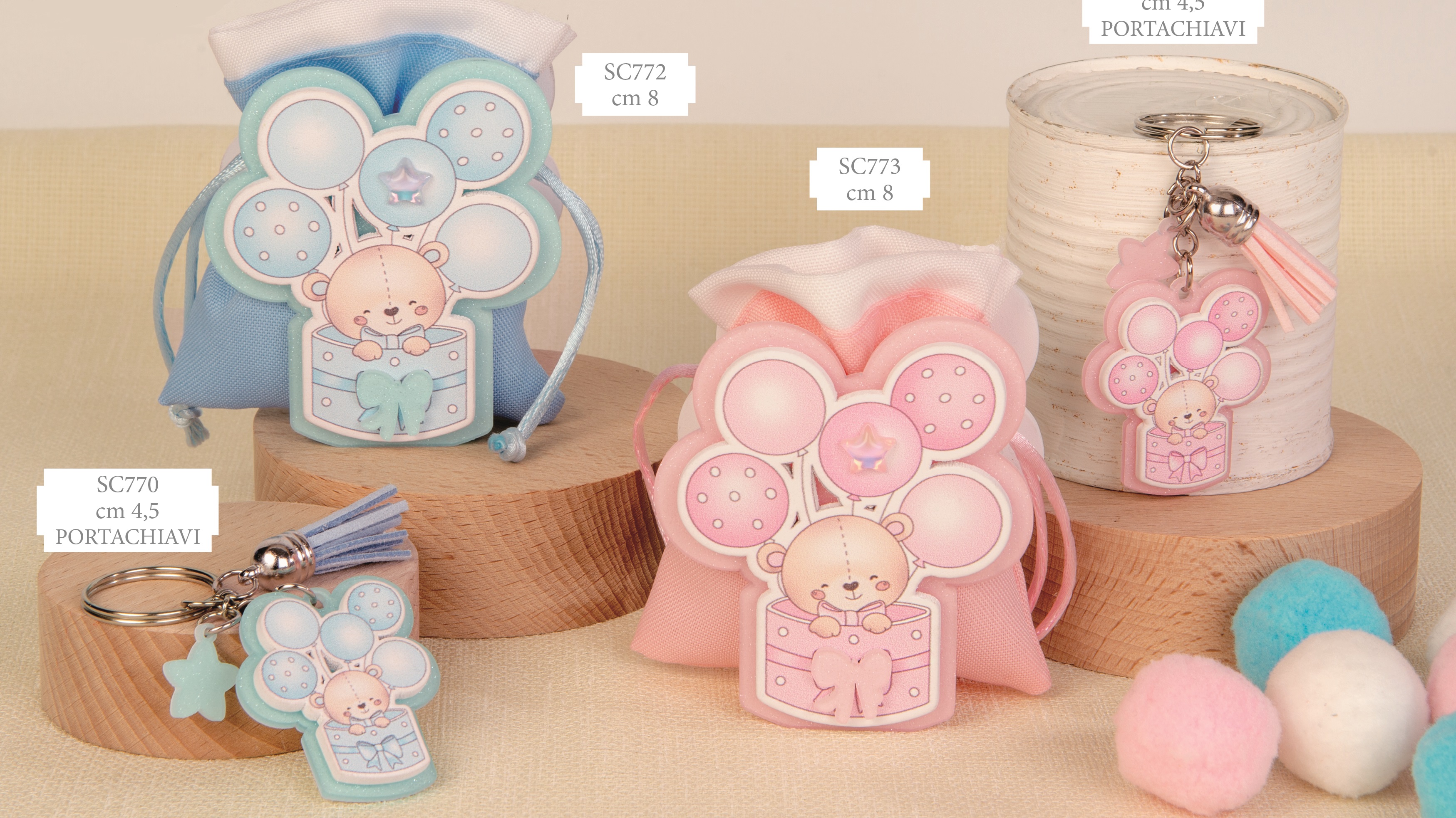 Collezione Sorriso portachiave 4.5 cm e sacchetto 8 cm in celeste e rosa per bomboniere nascita e battesimo